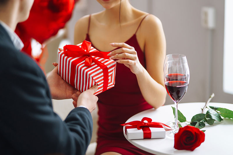 exchange-of-gifts-young-couple-celebrating-valent.jpg